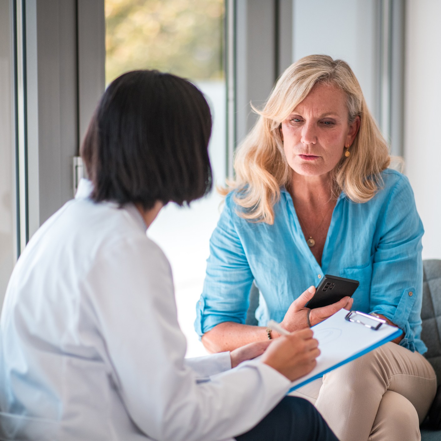 Provider consulting with patient